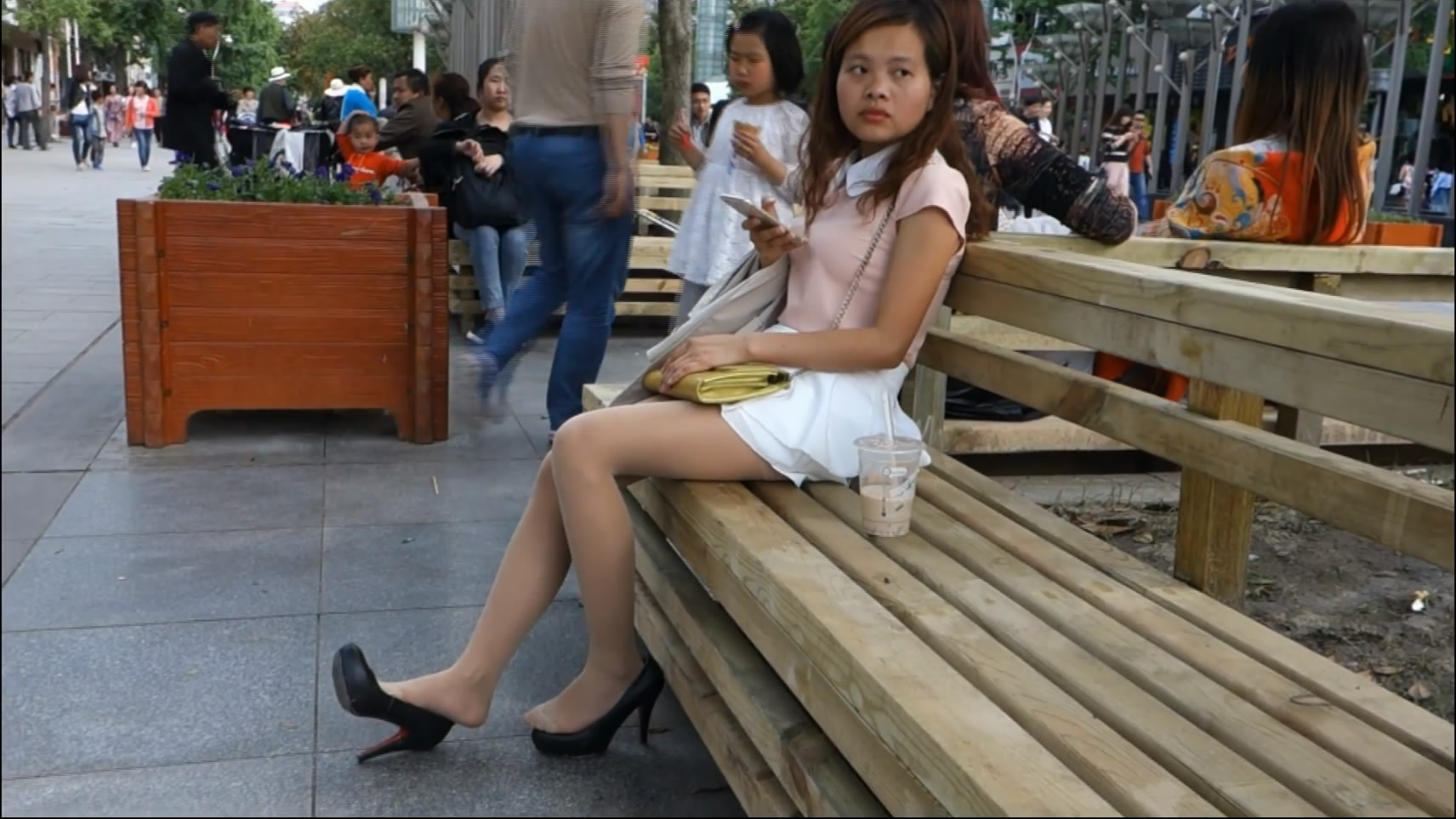 Young Woman Looked Arround for Waiting for Someone